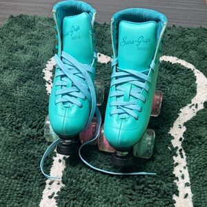 Sure-Grip Teal Roller Skates